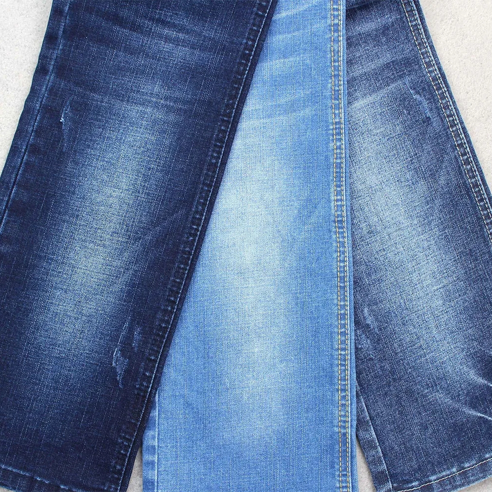 jeans material crossword clue