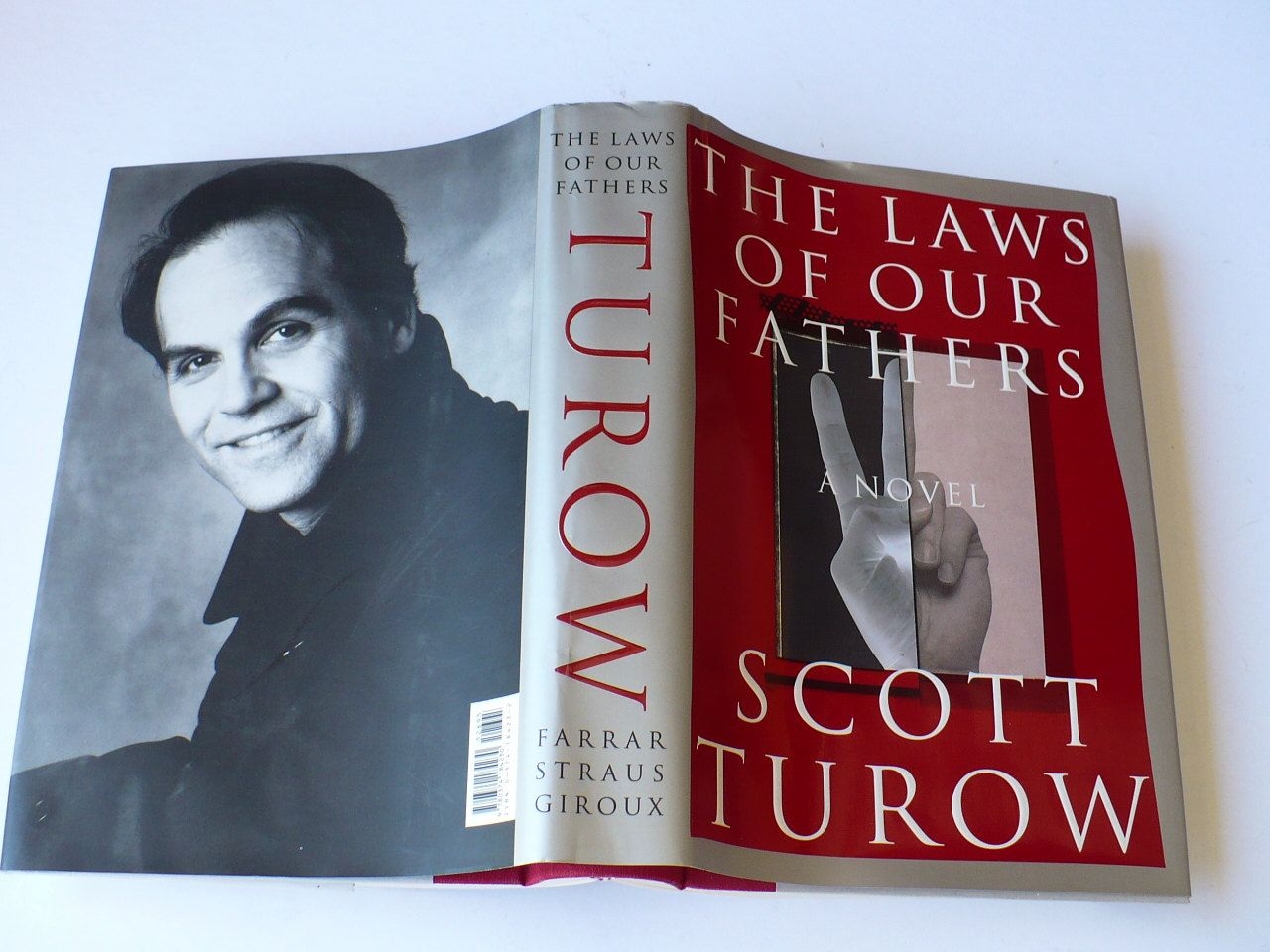 Scott Turow Novel Crossword Clue